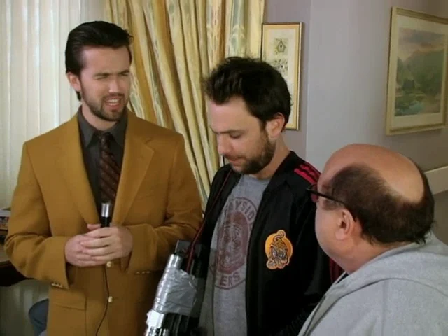 Still from Frank Sets Sweet Dee on Fire